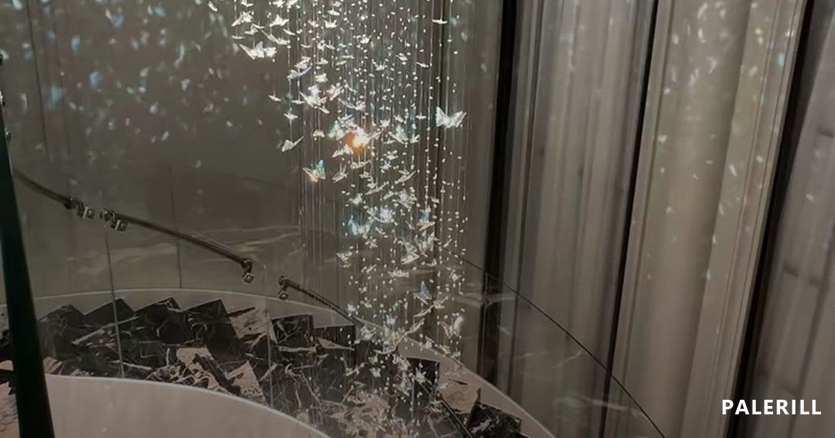 Cascading crystal butterfly chandelier falling through a double-height stairwell void