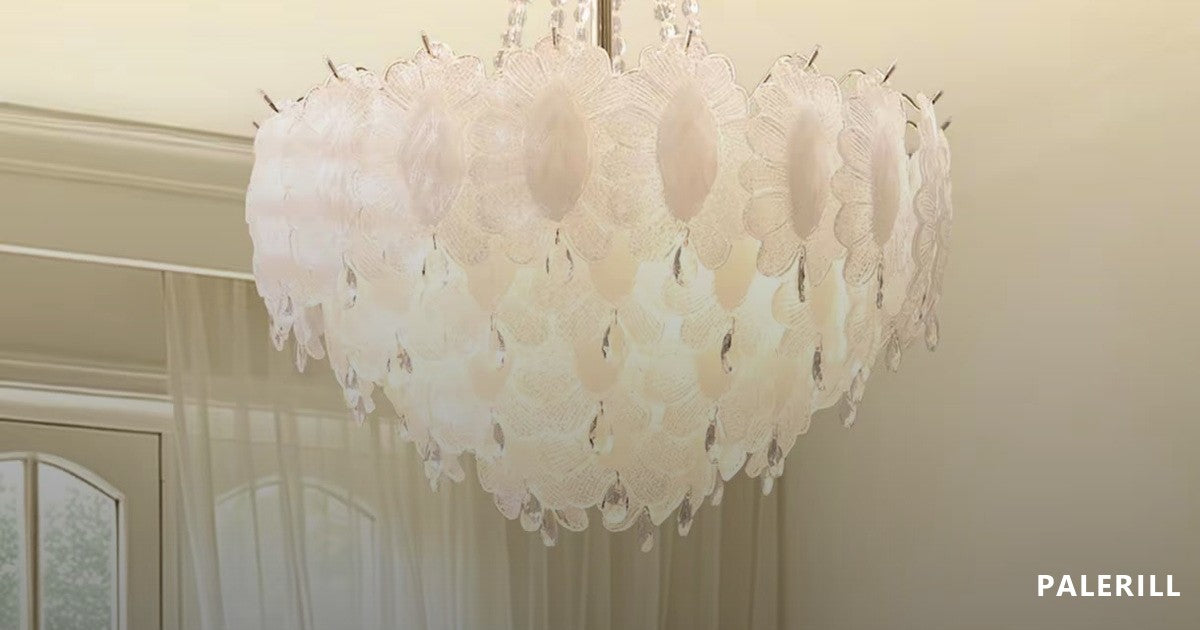 Cream glass petal chandelier in a bright living room with floor-to-ceiling curtains