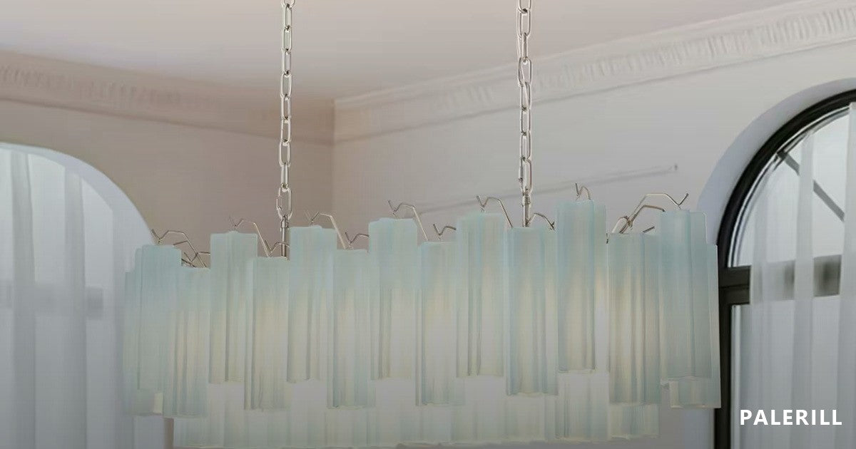 Frosted glass chandelier over a dining setting